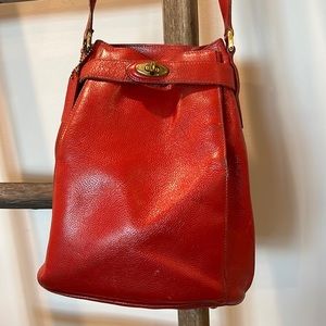 COACH VINTAGE Madison “drawstring” bag with click closure….RED in color.